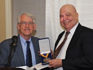Dr. Richard Hoavnnisian, right, being awarded the "President's Medal of Distinction" by Fresno State President Dr. John Welty. Photo: Alain Ekmalian