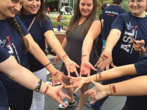 Students display the Armenian flag tattoos applied during Armenia’s Independence Day celebration held on September 21 in the Free Speech area of Fresno State. Photo: ASP Archive