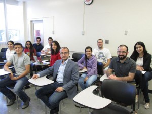 Dr. Khatchig Mouradian, seated center, with students from his Armenian Genocide class. Photo: Barlow Der Mugrdechian